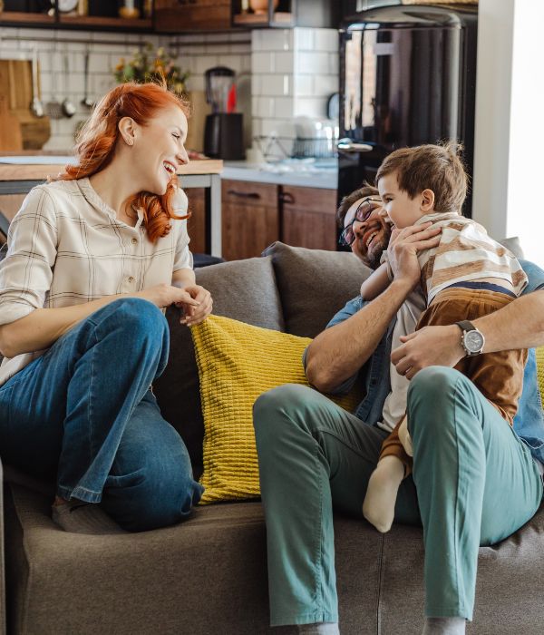 image of a happy family in a living room